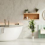 Căzi freestanding albă într-o baie modernă cu decor minimalist și plante verzi