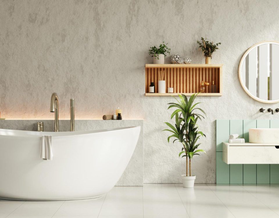 Căzi freestanding albă într-o baie modernă cu decor minimalist și plante verzi